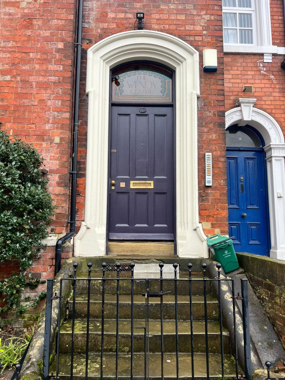 Clinic entrance door on Wilson Street Derby