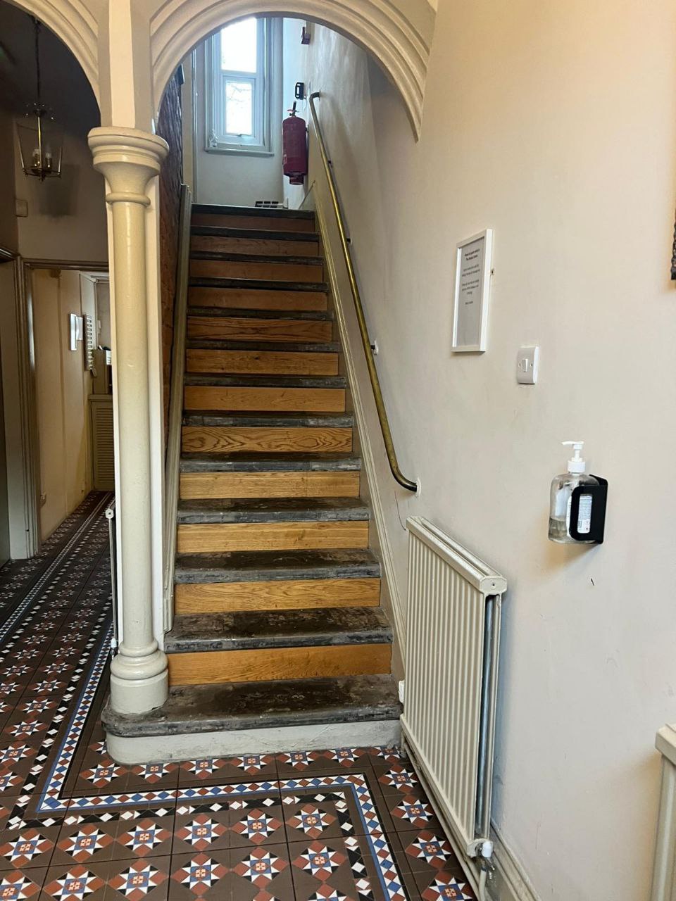 Door with number 6 plaque at Wilson Street Derby